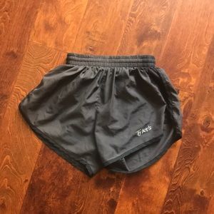 Tyler’s gray running shorts